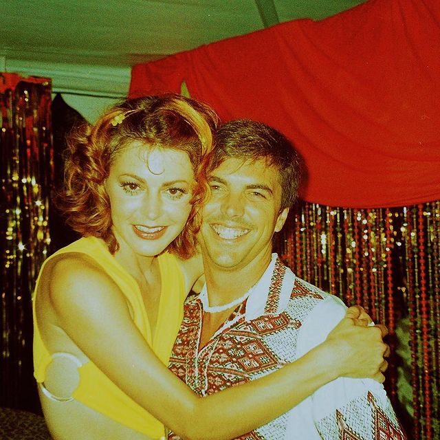 Jane Leeves in a yellow top and Marshall Coben in a white dress.